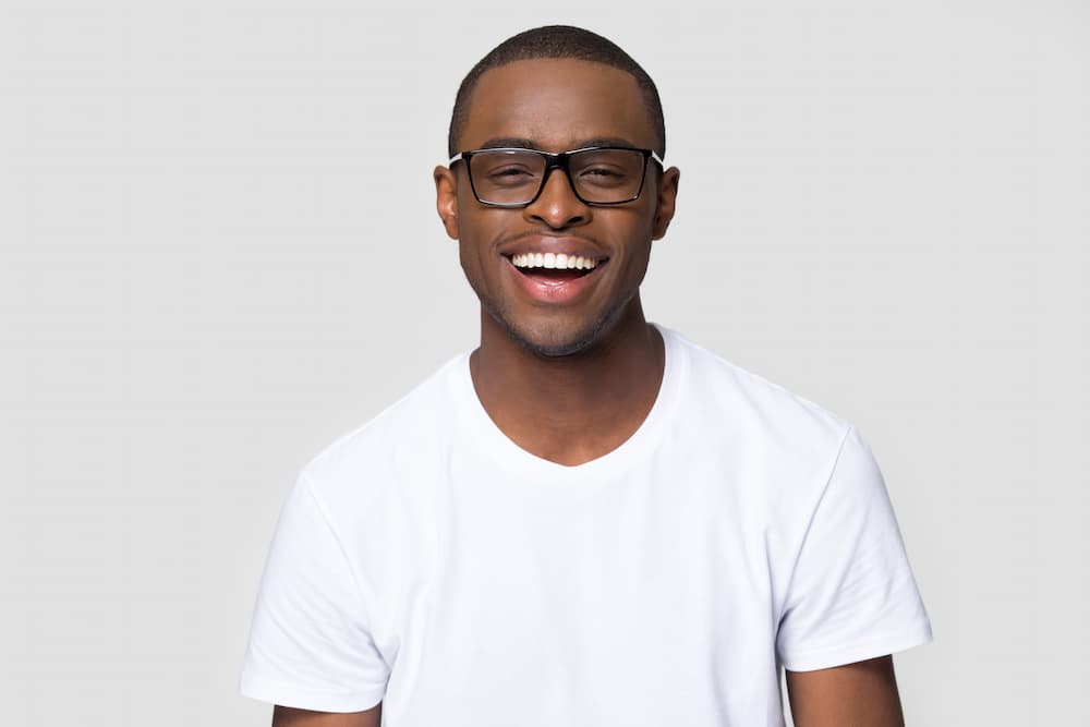 Young african american male smiling showing his very white teeth